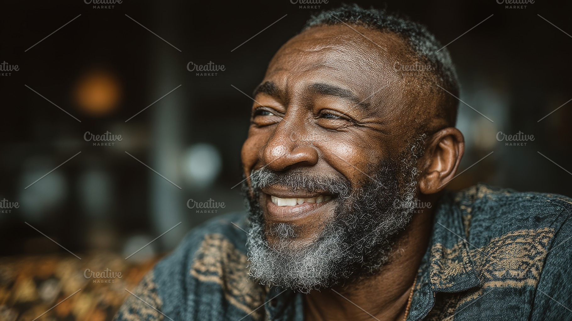 Smiling senior black man with a beard in a comfortable indoor setting, a Health & Medical Photo by AS photostudio