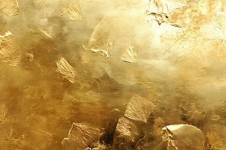 Golden Foil Texture with Luxurious Metallic Shine, a Background Photo by Photostock