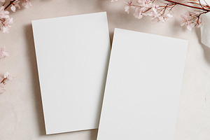 Blank white invitation cards mockup with blooming cherry blossoms for elegant s, a Holiday Photo by Studio ANNA