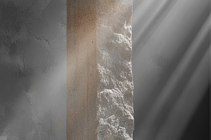 Minimal stone monolith sculpture with dramatic light rays in mod, an Abstract Photo by José Manuel Gelpi