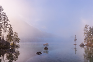 Foggy lake and mountain