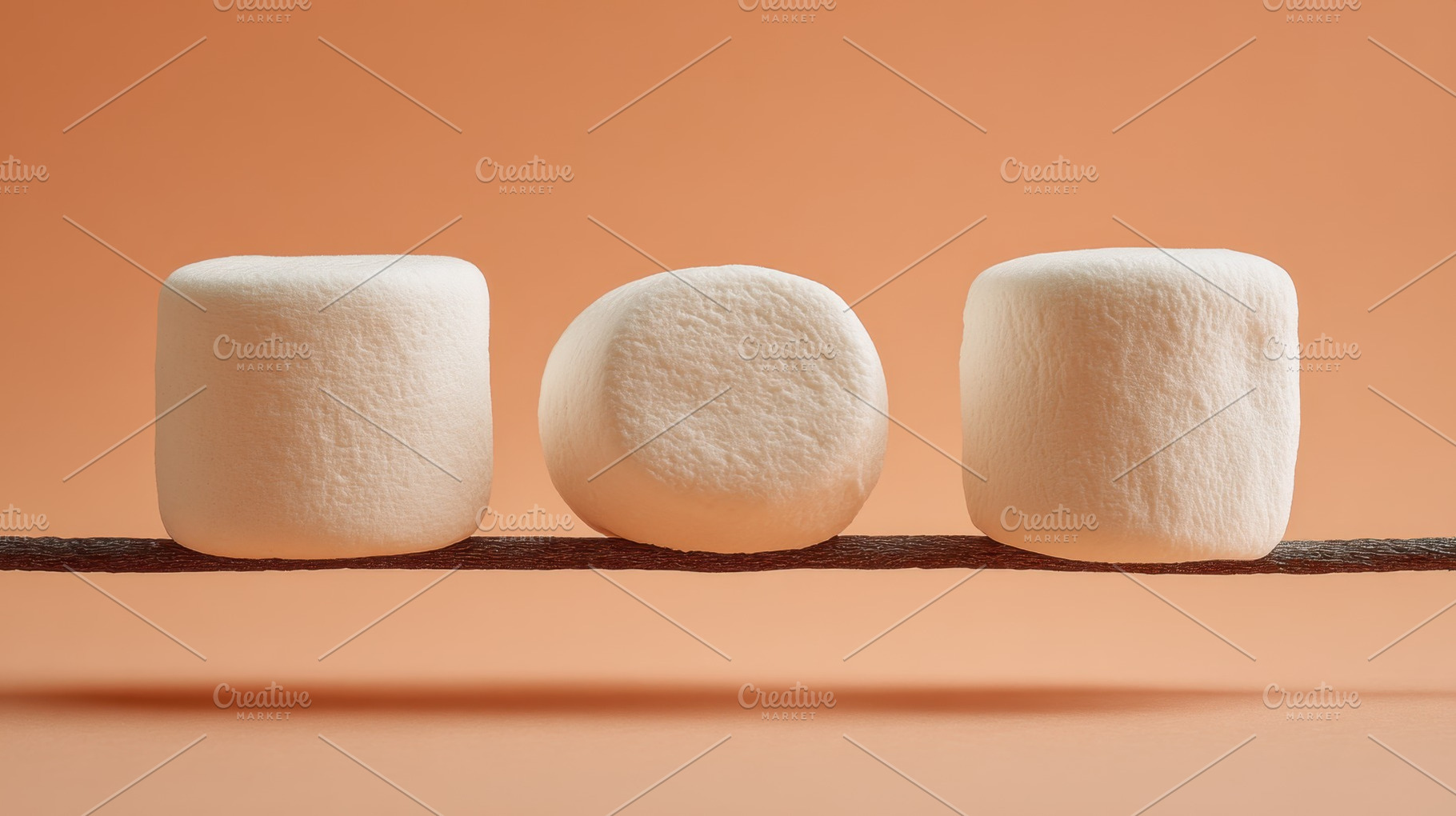 Marshmallows on a stick in a row, a Photo by Beautiful things