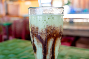 Avocado cocoa milkshake in Toraja land, Sulawesi, Indonesia, a Nature Photo by GoodGoods
