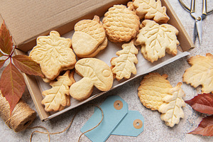 Autumn cookies in gift box with leaves and twine, a Food & Drink Photo by Olena Rudo
