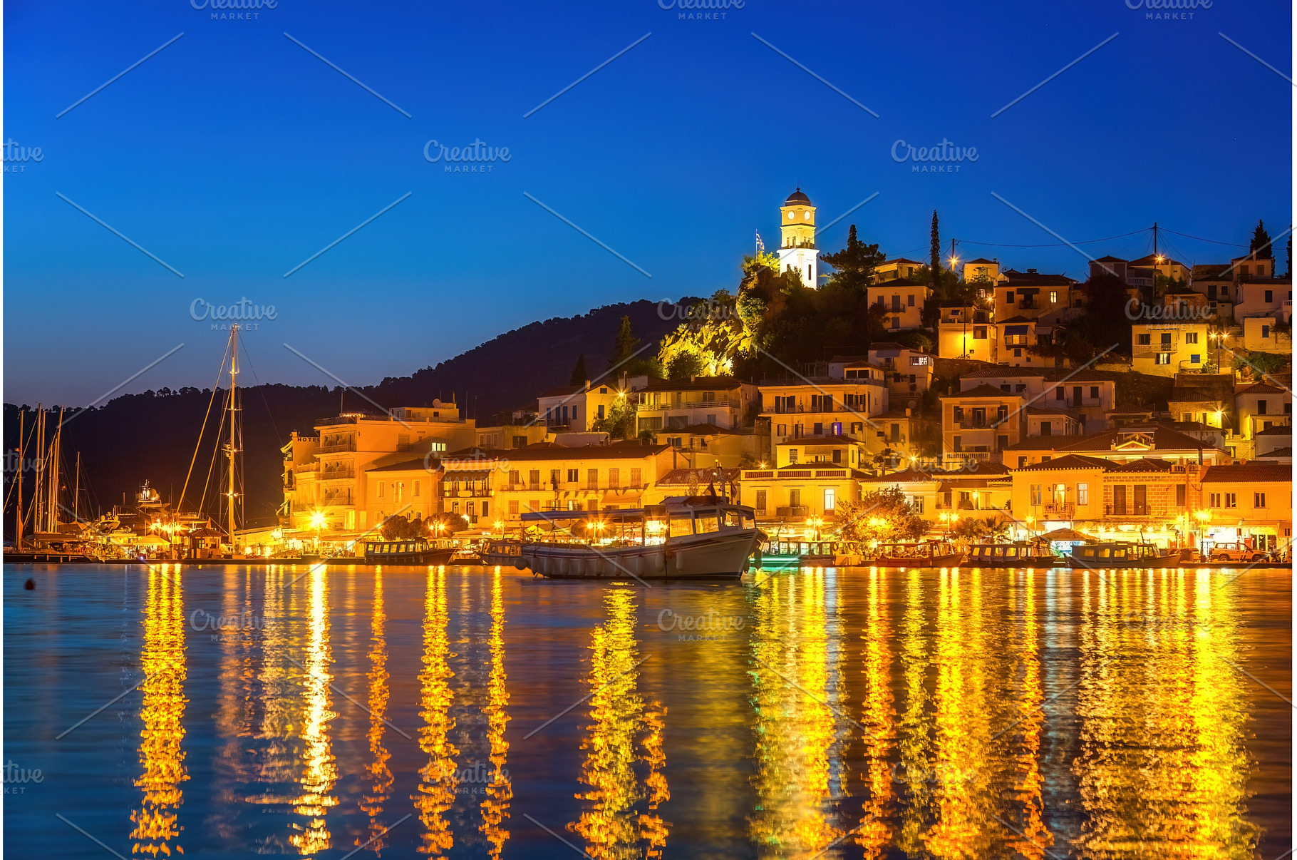 Greek island Poros at night, an Architecture Photo by sborisov