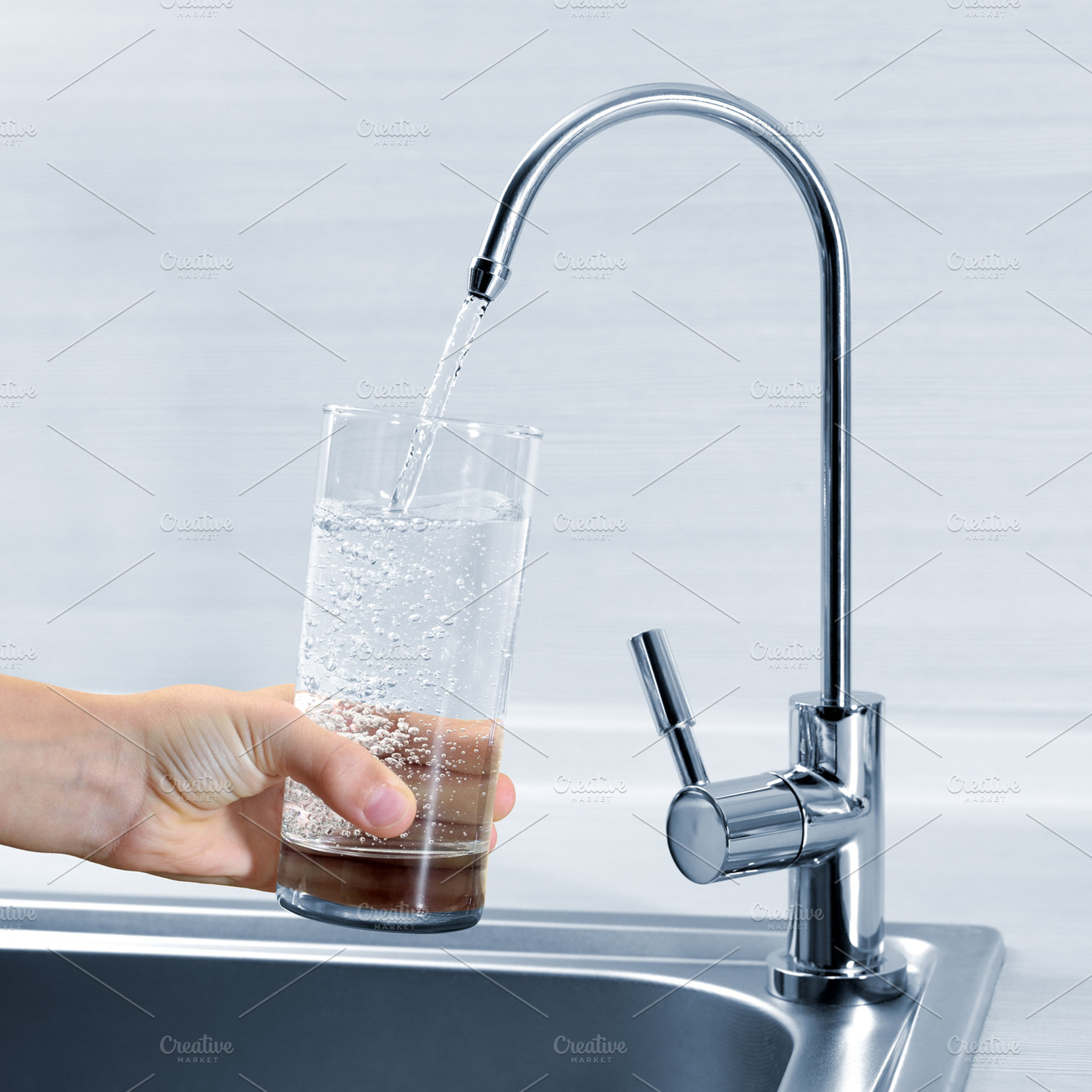 Filling Glass Of Water Featuring Water Glass And Hand