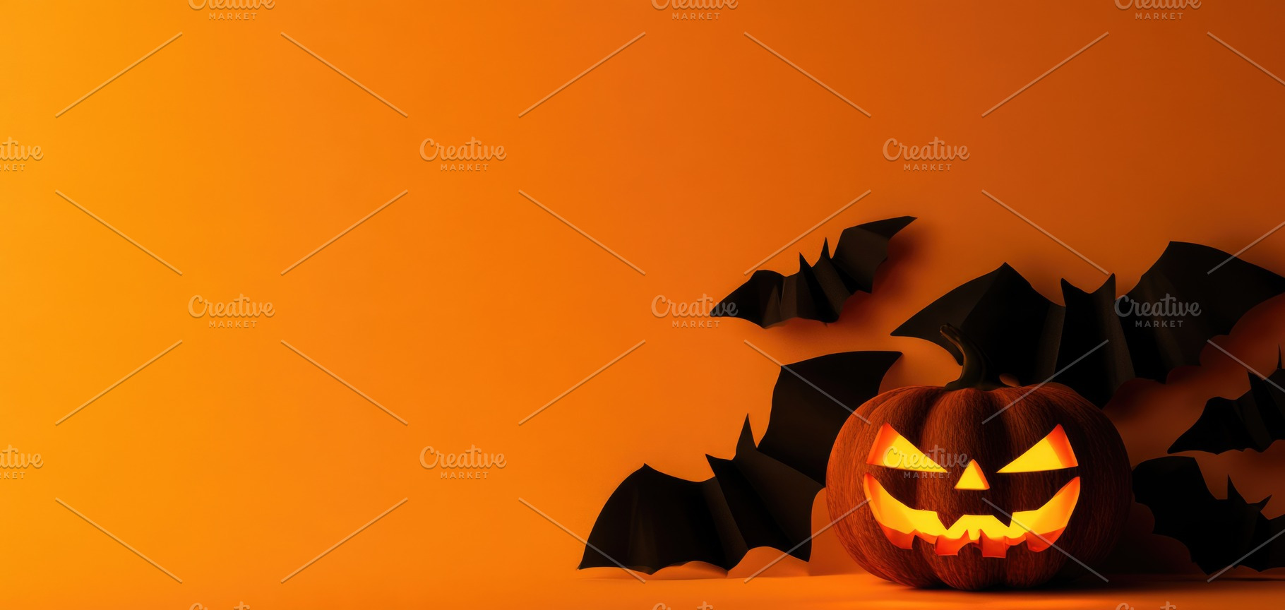 Glowing jack o lantern with black bats on orange Halloween backg, a Person Photo by José Manuel Gelpi