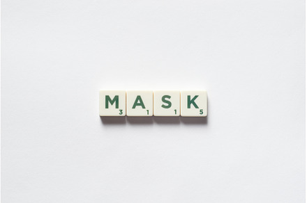 Mask formed of scrabble blocks., a Health & Medical Photo by Yaroslav Danylchenko