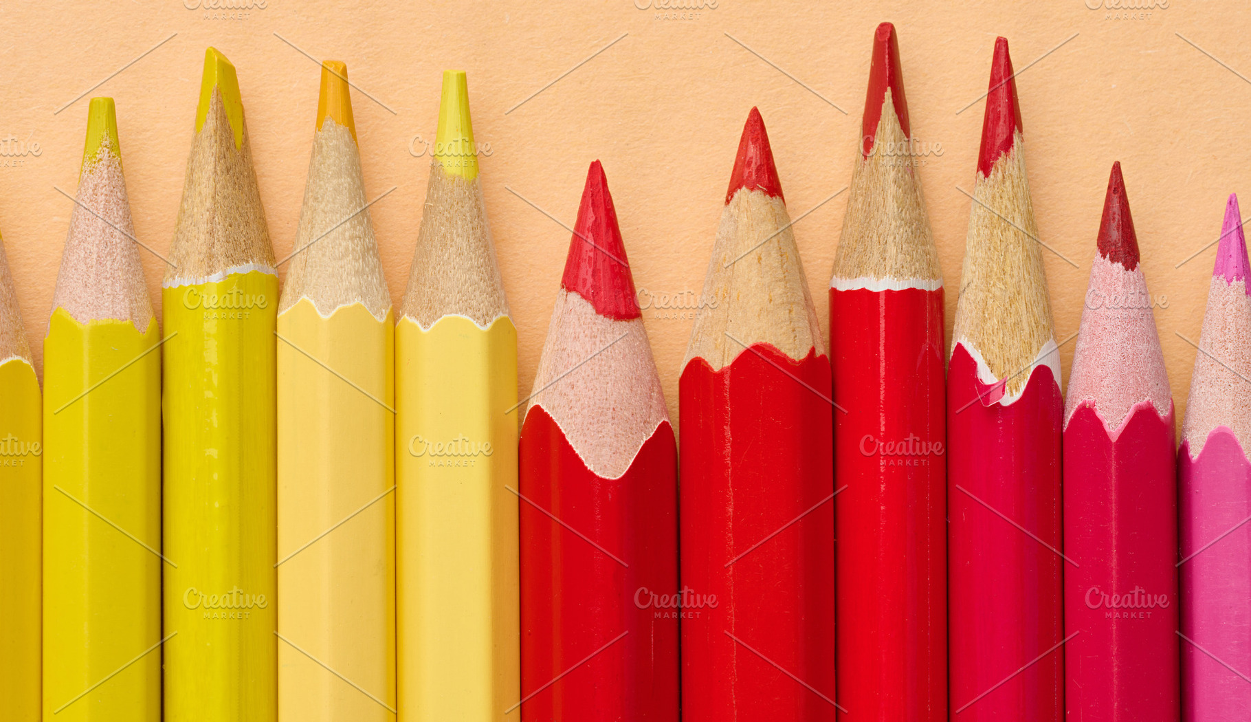Multicolored wooden pencils in a row, drawing and creativity too, a School & Education Photo by ndanko