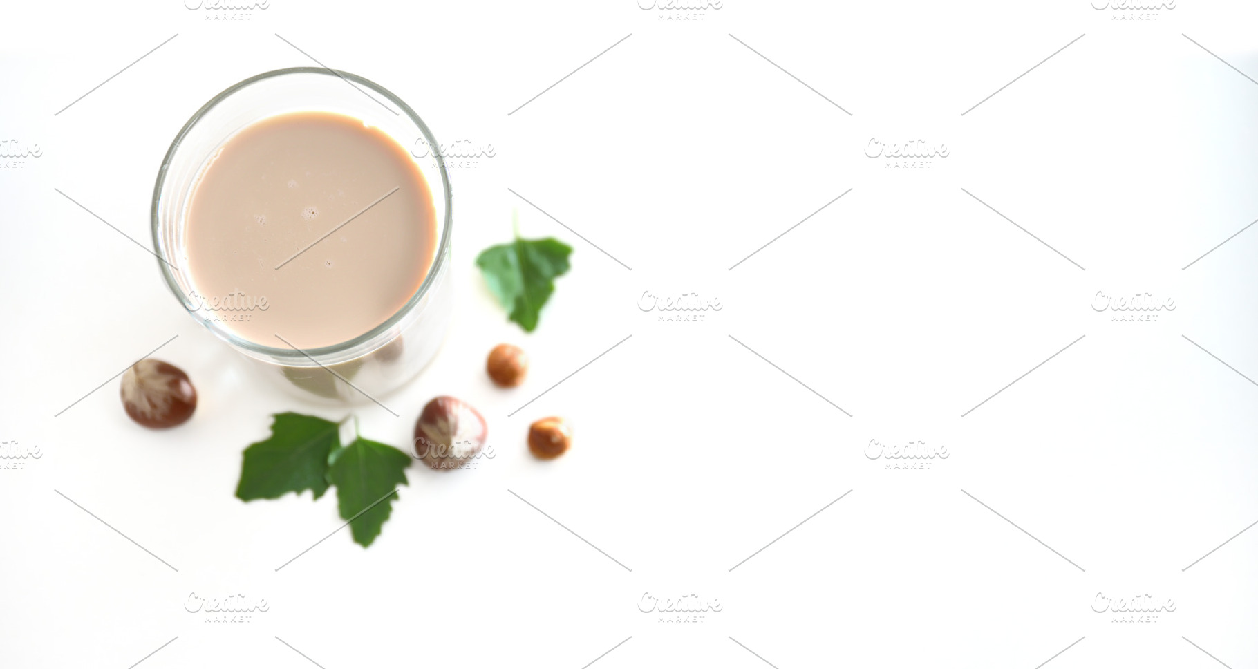 Hazelnut alternative plant-based drink background white isolated, a Food & Drink Photo by Davizro's Market