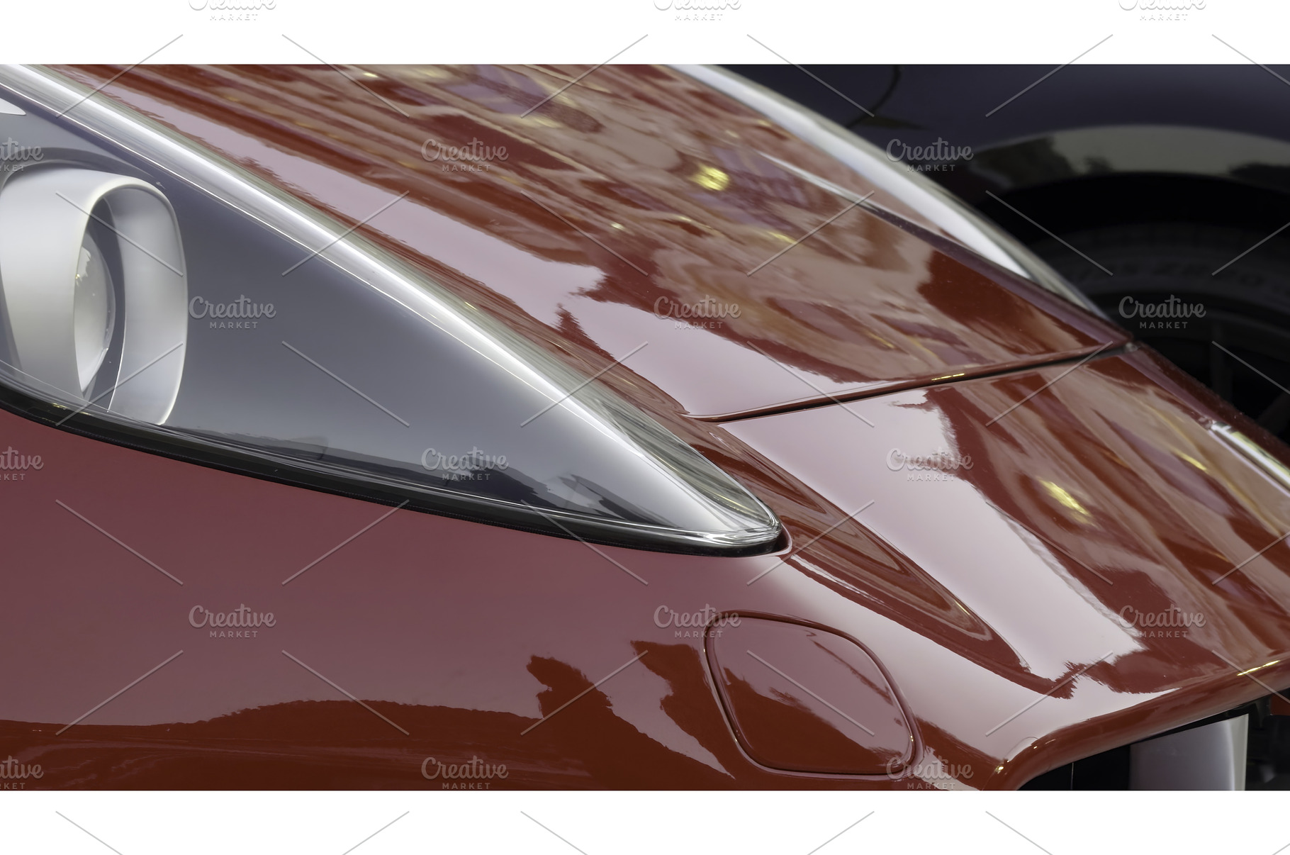Red sports car reflecting city, a Transportation Photo by Media Whale Stock