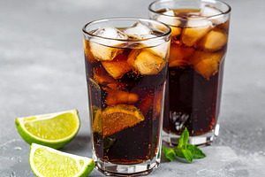 cola drink with ice and lime AI generated, a Photo by WorldOfPhotos