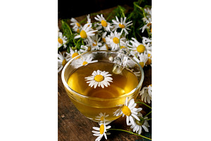 Chamomile Tea Cup with Fresh Daisies
