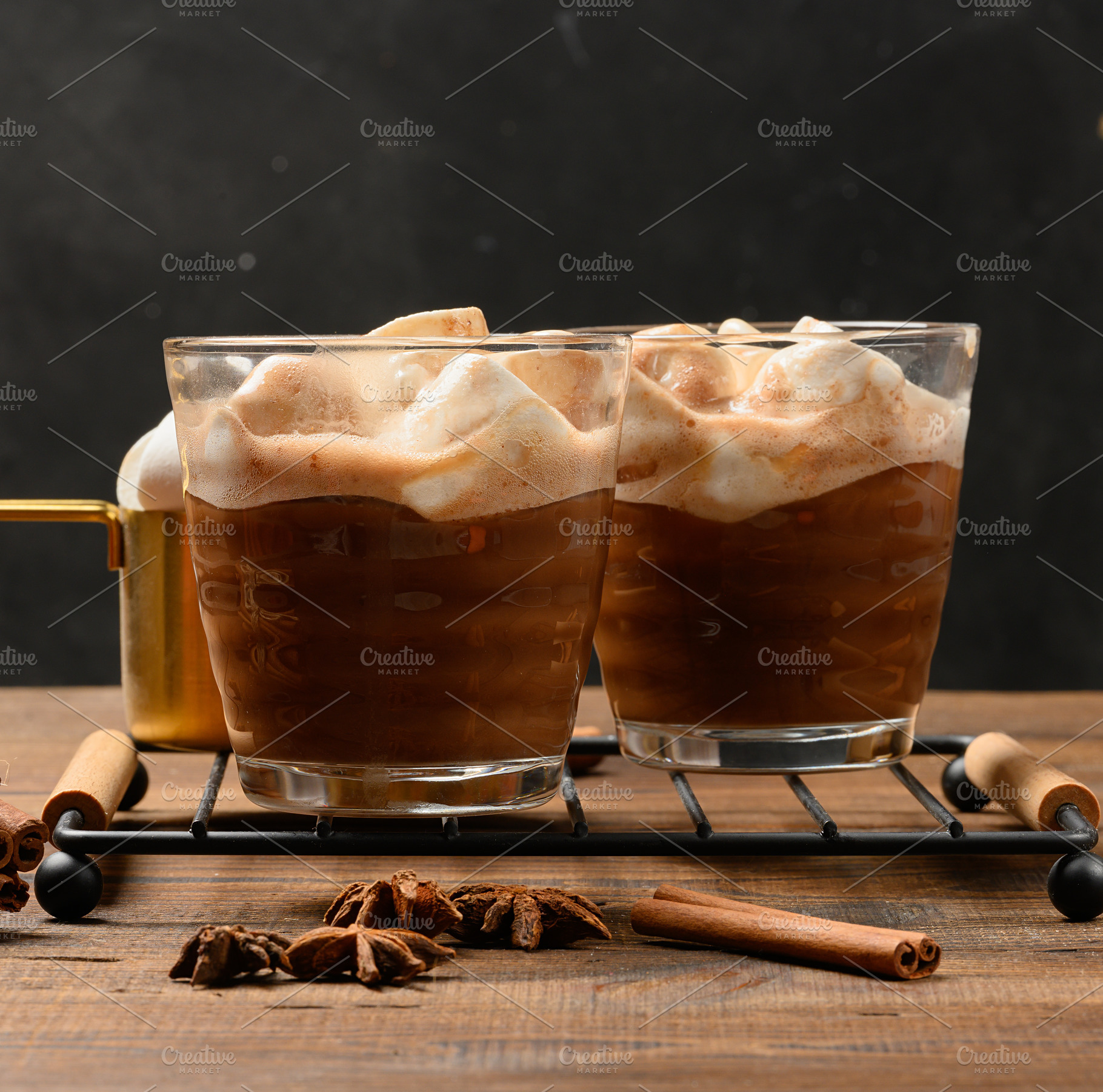 Hot chocolate with fluffy marshmallows on a wooden board., a Food & Drink Photo by ndanko