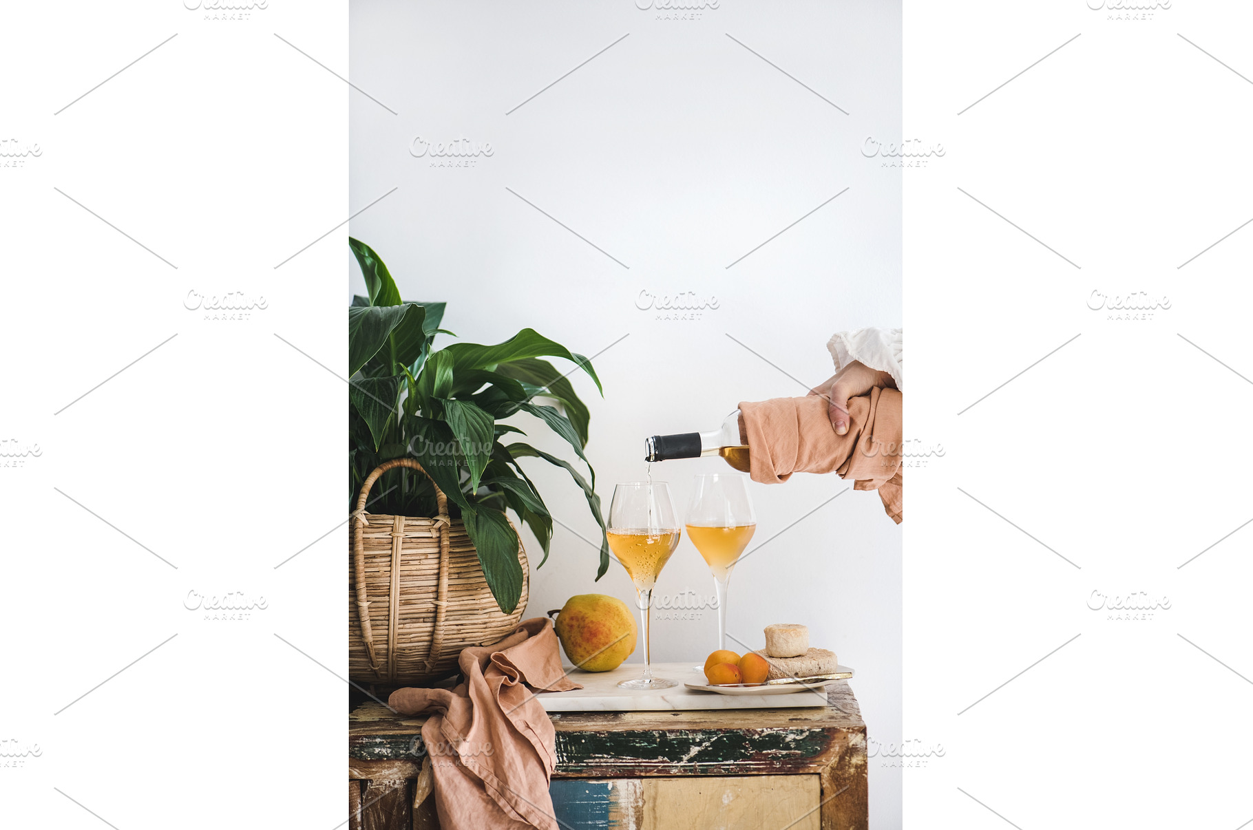 Female hand pouring Orange or Amber, a Food & Drink Photo by Foxys