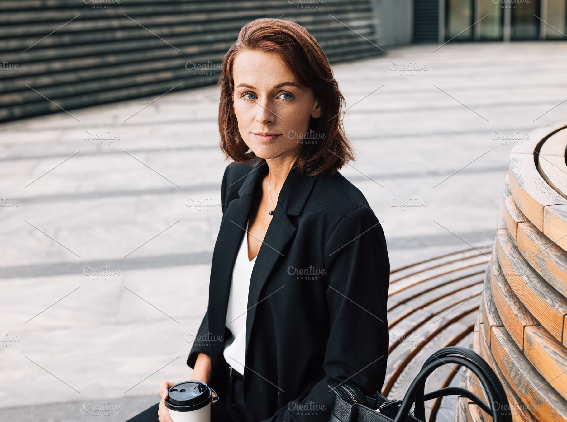 Middle-aged business woman, a Business Photo by Artem Varnitsin