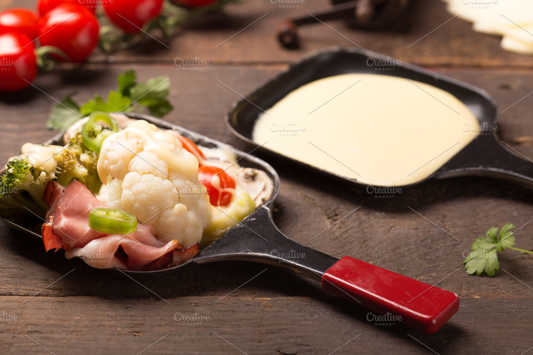 Healthy ingredients for raclette containing raclette, broccoli, and cheese, a Food & Drink Photo by peterzsuzsa