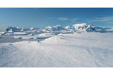 People jogging snow slope in winter, a Sports & Recreation Photo by Mozgova