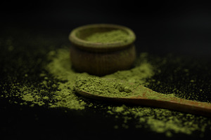 Green matcha tea containing matcha, tea, and green