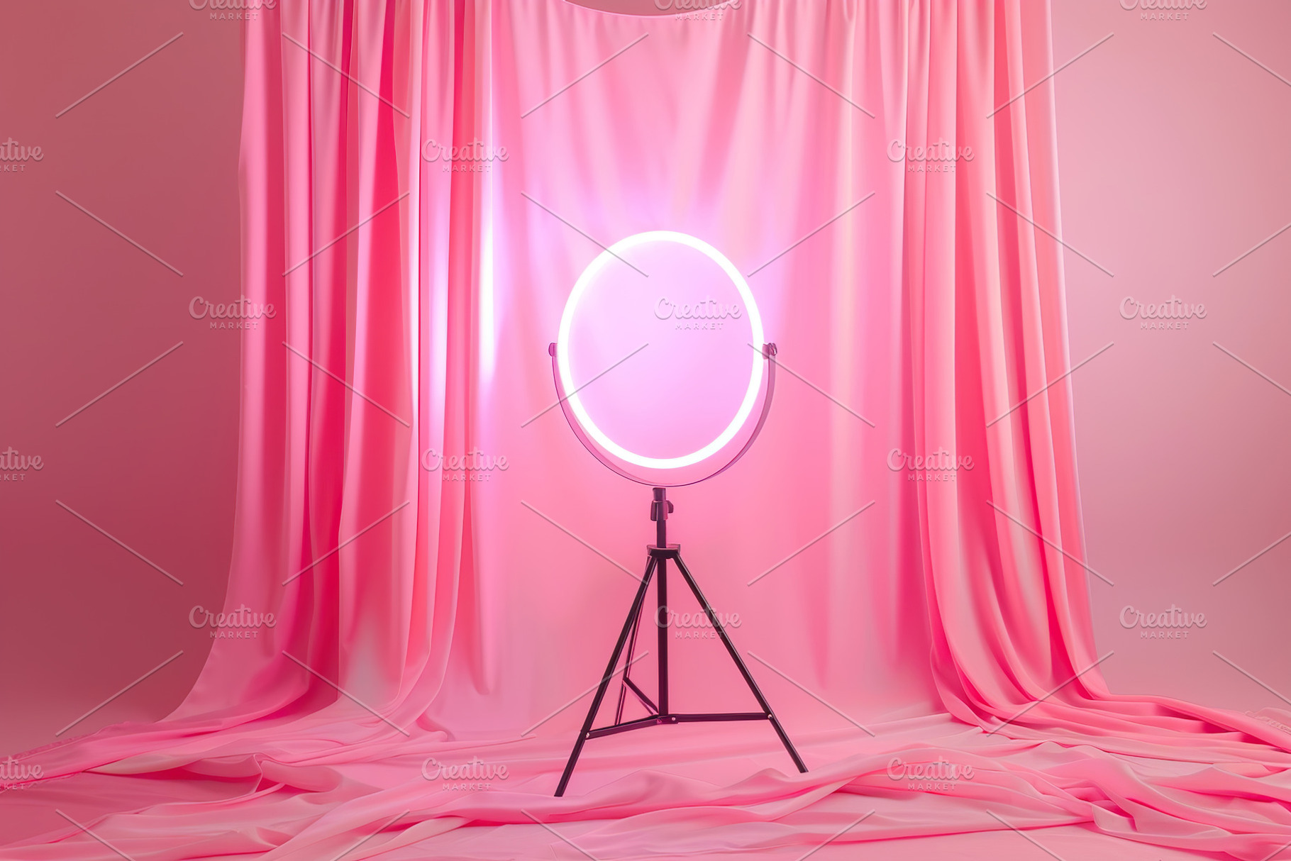 Selfie light lamp on pink fabric textile background, a Technology Photo by AlyaAnd