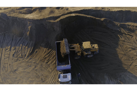 Top view of excavator with dump, an Industrial Photo by Media Whale Stock