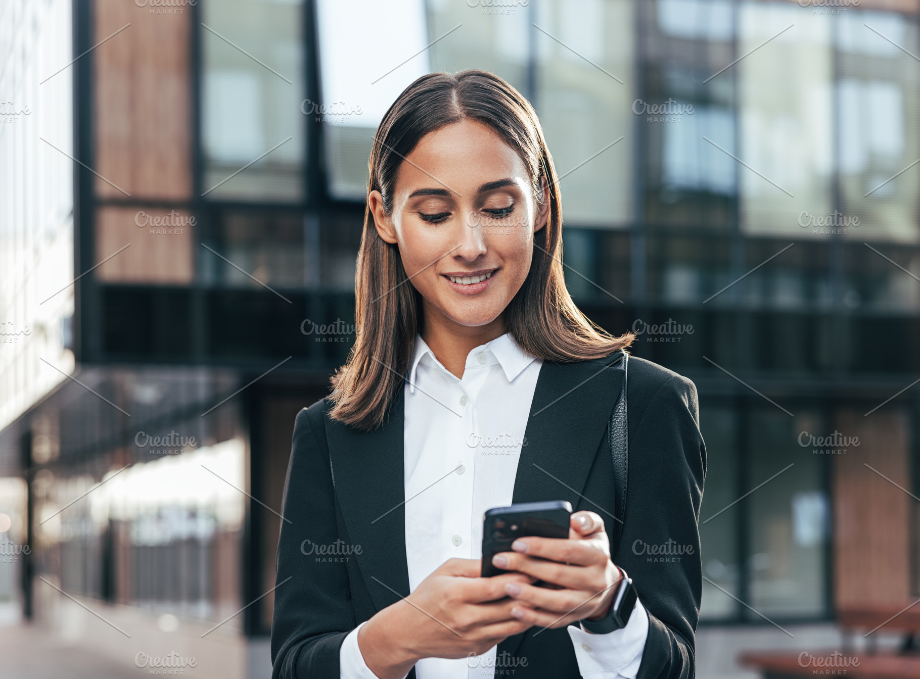 Smiling confident woman in formal, a Business Photo by Artem Varnitsin