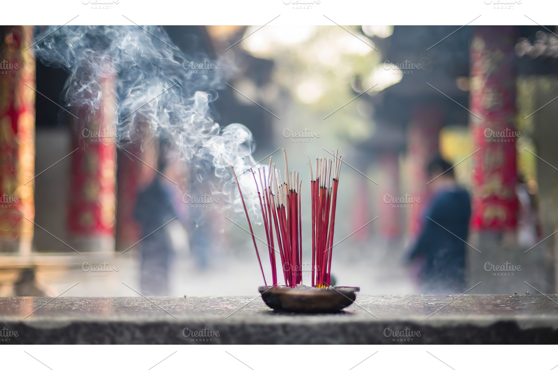 Burning incense sticks releasing, a Background Photo by Igor Tichonow