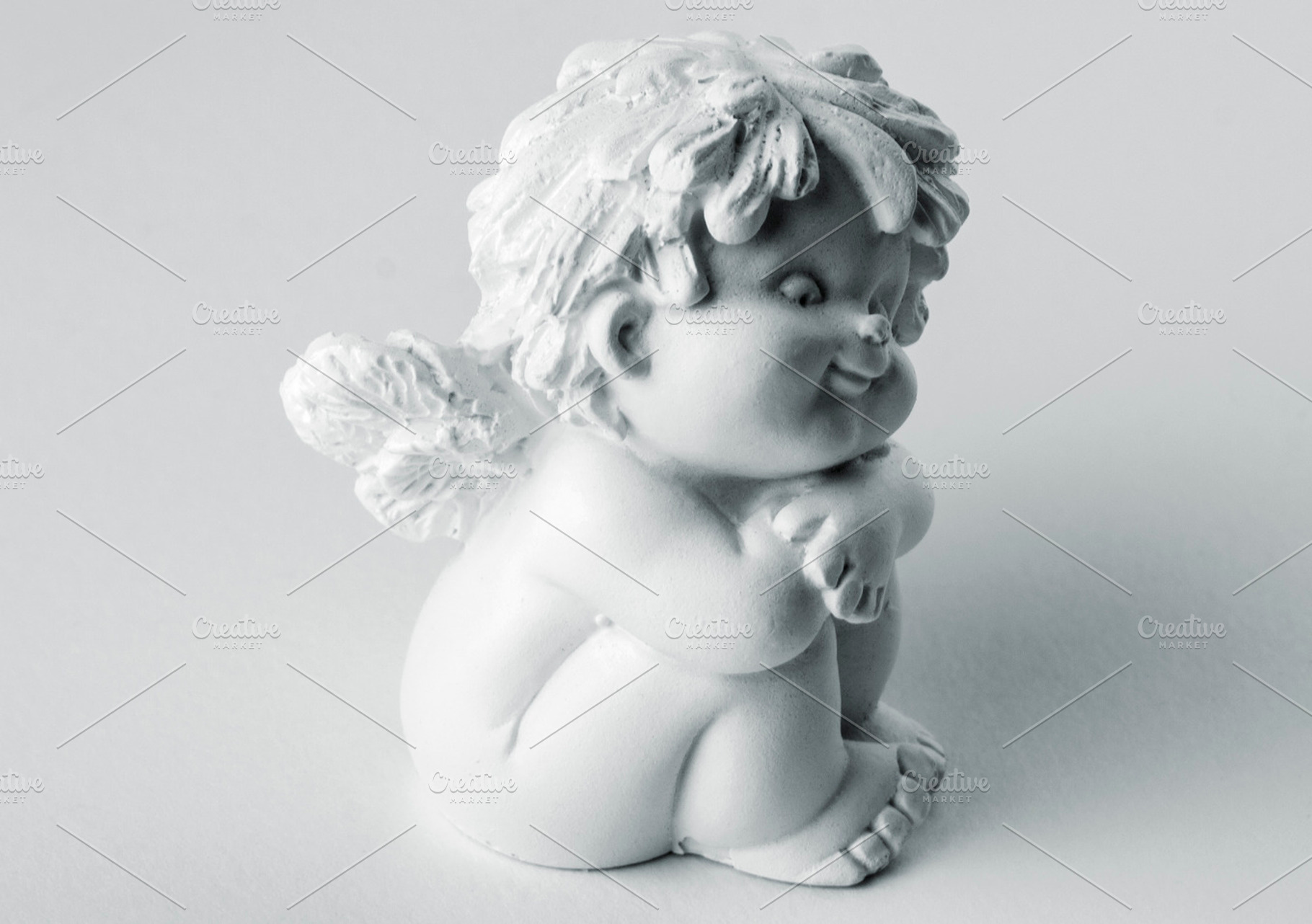 Cupid sculpture, an Arts & Entertainment Photo by BOOCYS