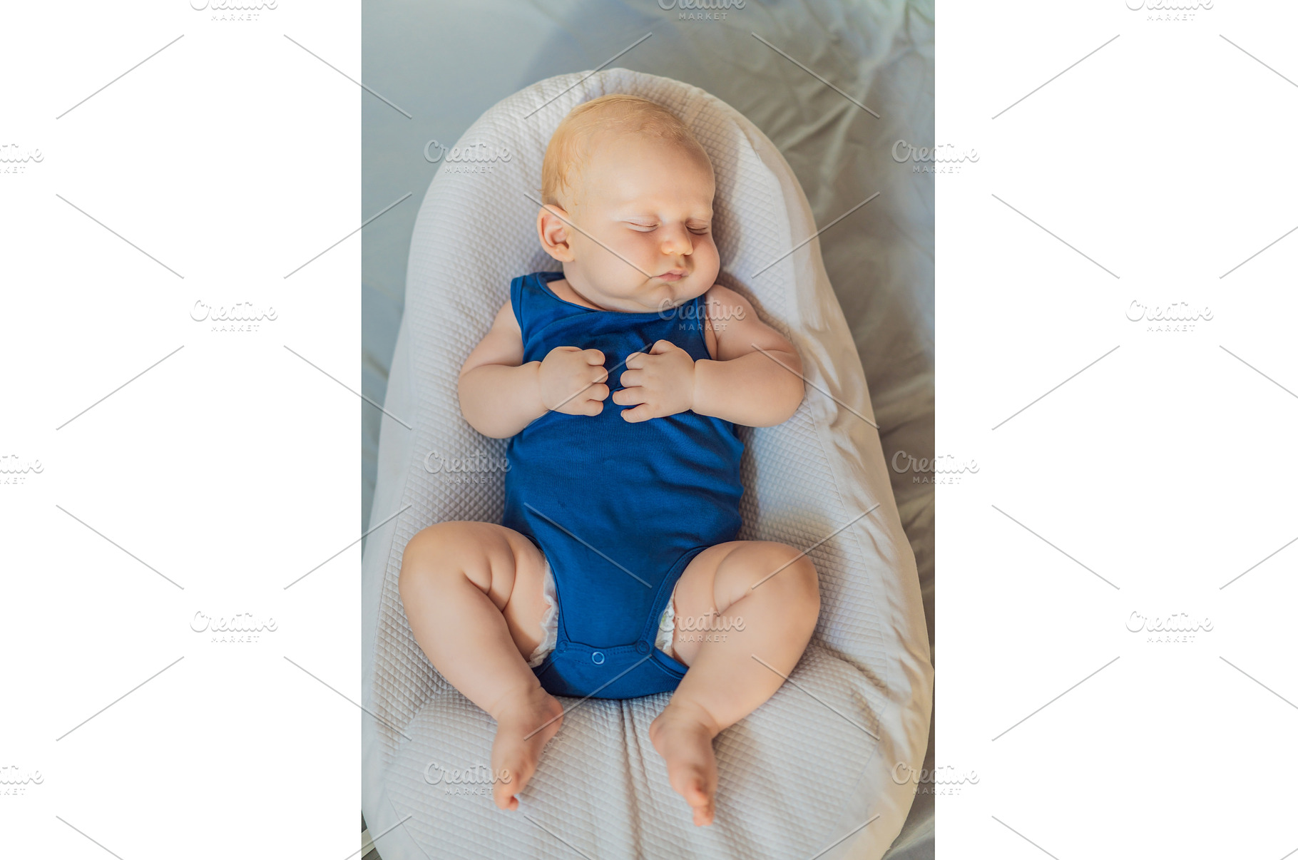 Chubby 3-month-old baby peacefully, a Person Photo by Elizaveta Galitskaya