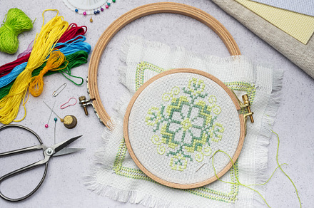 Embroidery with colored threads and various sewing accessories, an Arts & Entertainment Photo by Olena Rudo