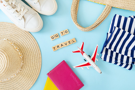 Go on a trip inscription on a blue background along with a passport, a toy plan, a Beauty & Fashion Photo by Artsaba Family