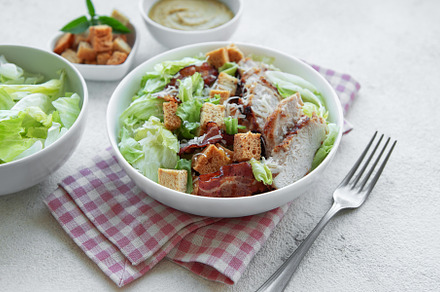 A bowl  of  Caesar salad, a Photo by Olena Rudo