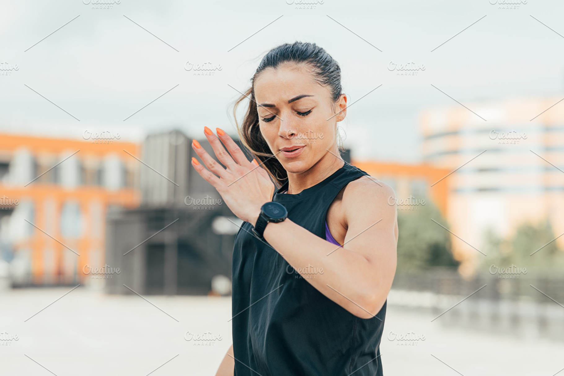 Woman in sportswear is warming up, a Sports & Recreation Photo by Artem Varnitsin