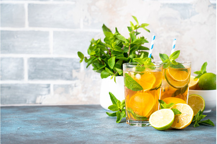Iced tea with lemon, lime, mint and, a Food & Drink Photo by Nadia-nb