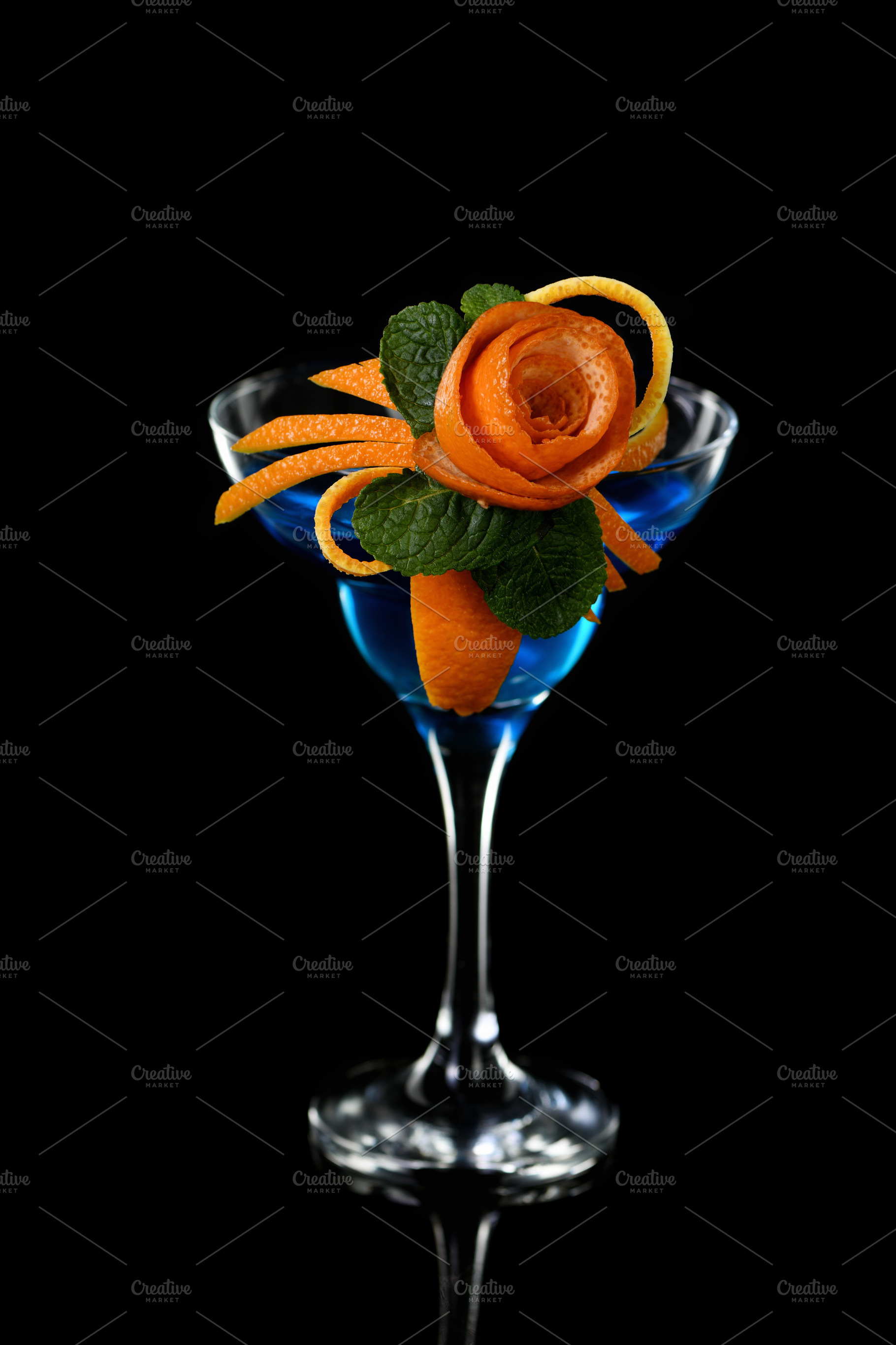 Art in orange- cocktail Blue lagoon, a Food & Drink Photo by Apolonia