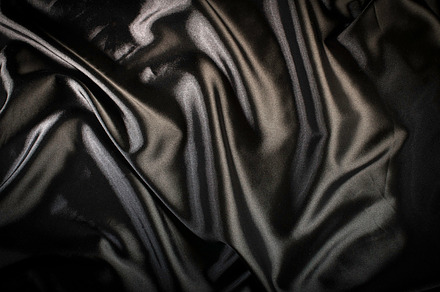 Shiny black satin fabric featuring background, fabric, and black, an Abstract Photo by Deyan Georgiev