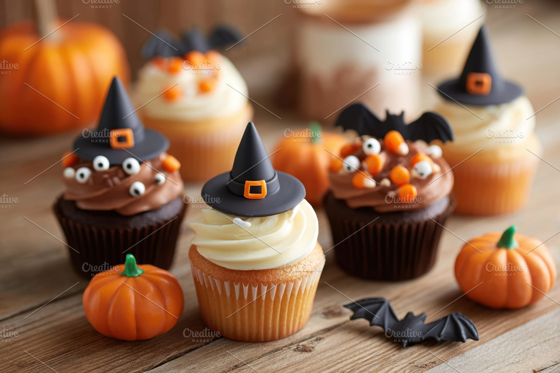 Festive cupcakes decorated for halloween holiday, a Food & Drink Photo by AlyaAnd