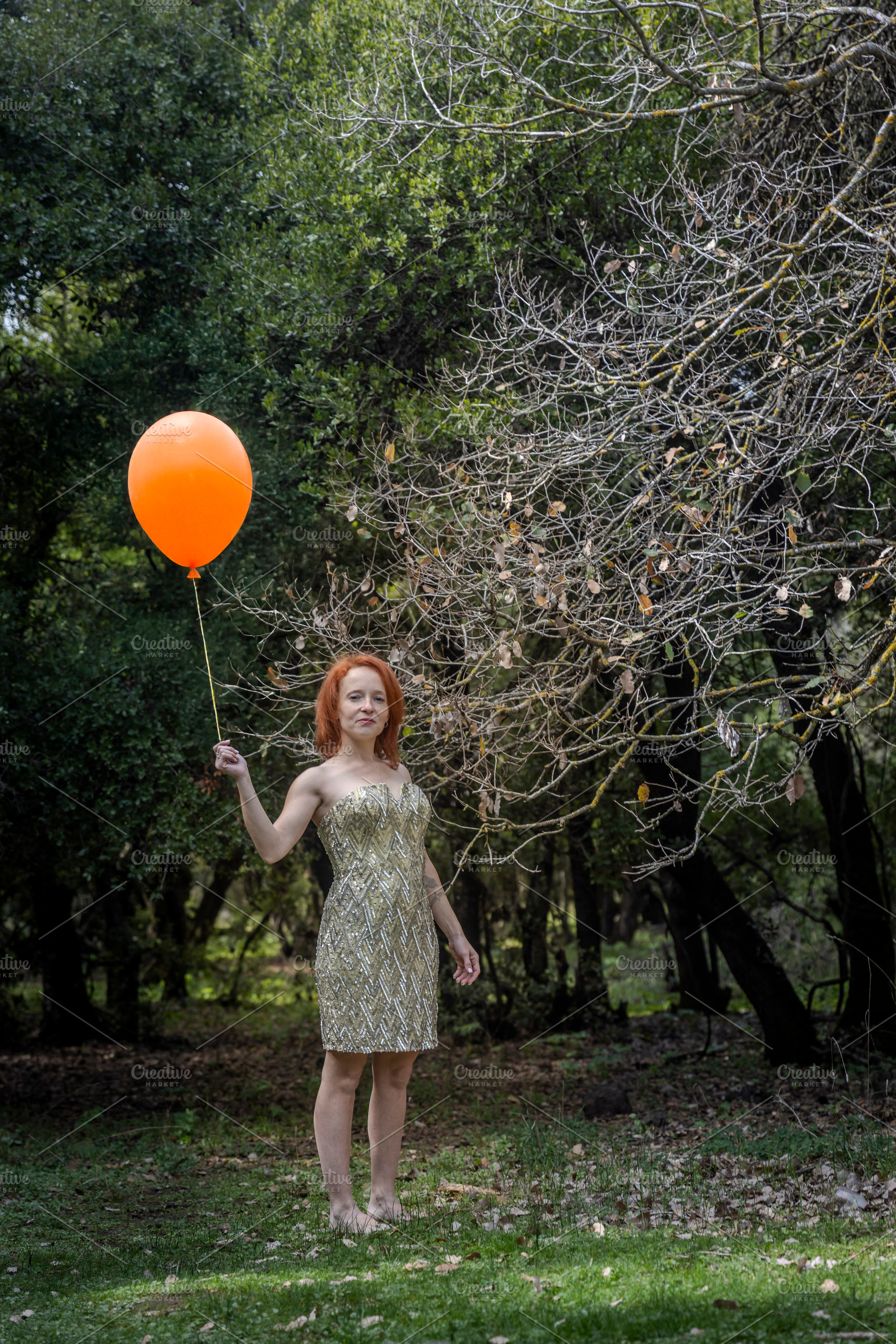 Portrait of a woman in a shiny gold, a Person Photo by Imaginarium