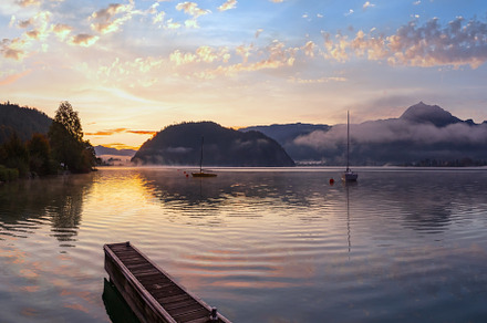 Peaceful autumn Alps mountain lake. Sunrise Wolfgangsee lake vie, a Nature Photo by YuriyB