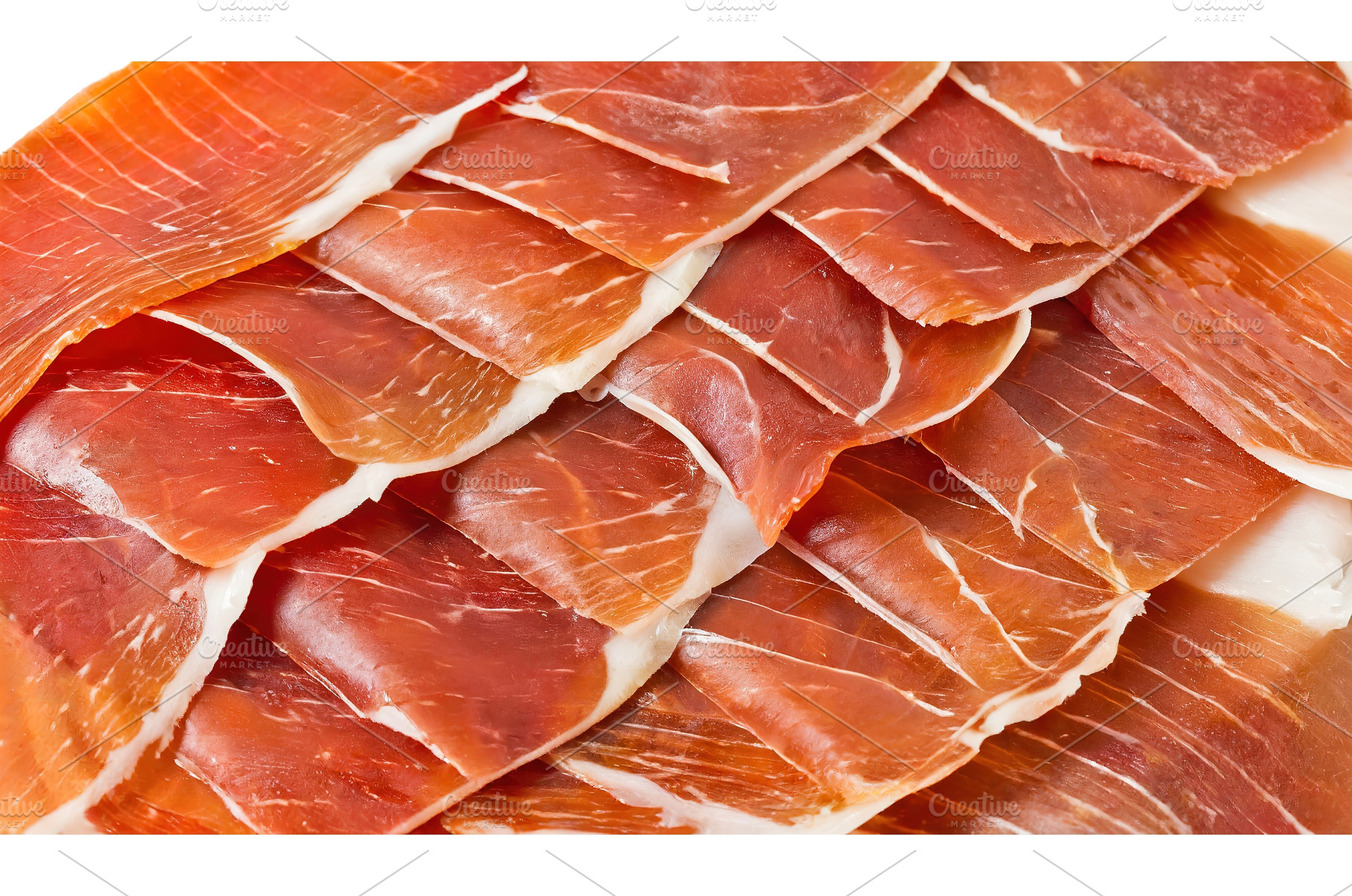 Thin slices of prosciutto ham, a Food & Drink Photo by Igor Tichonow