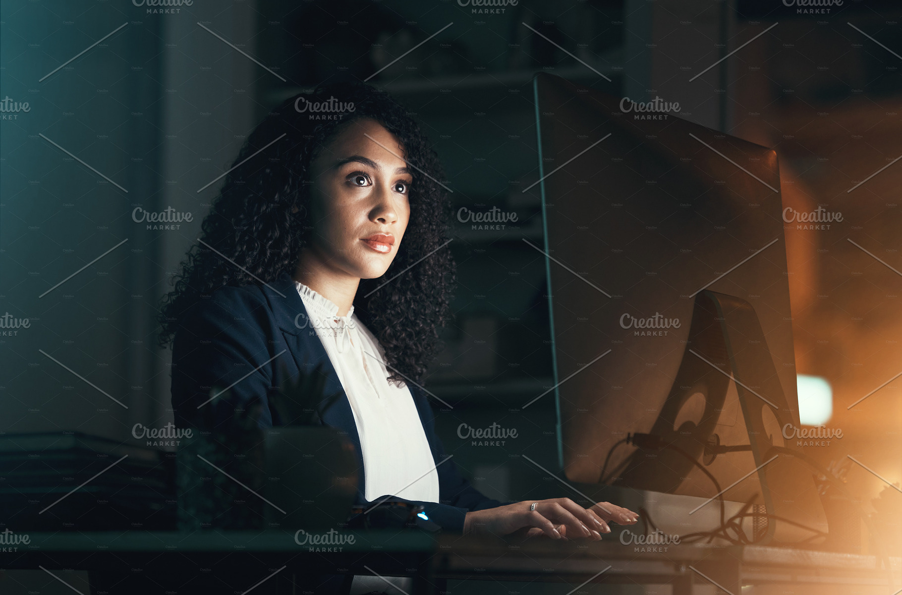 Night, office and black woman on computer for business project, management report and online document. Corporate worker, overtime and focused female working on strategy, planning and website research, a Photo by Peopleimages.com