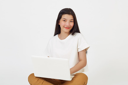 woman attractive sitting on the floor using laptop, a Person Photo by 1981 Rustic studio kan