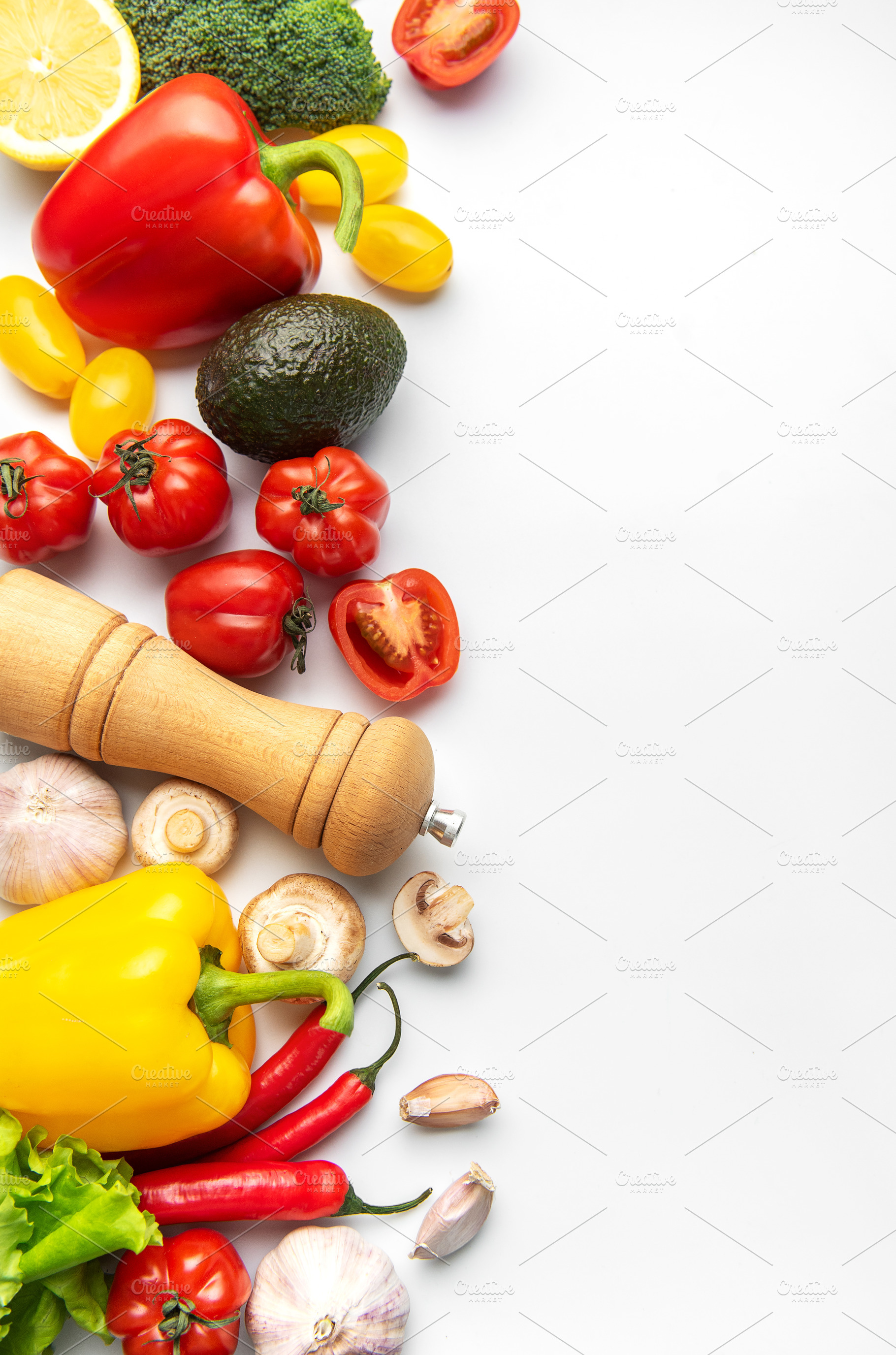 Fresh healthy vegetables for vegan cooking on white background, a Food & Drink Photo by Olena Rudo