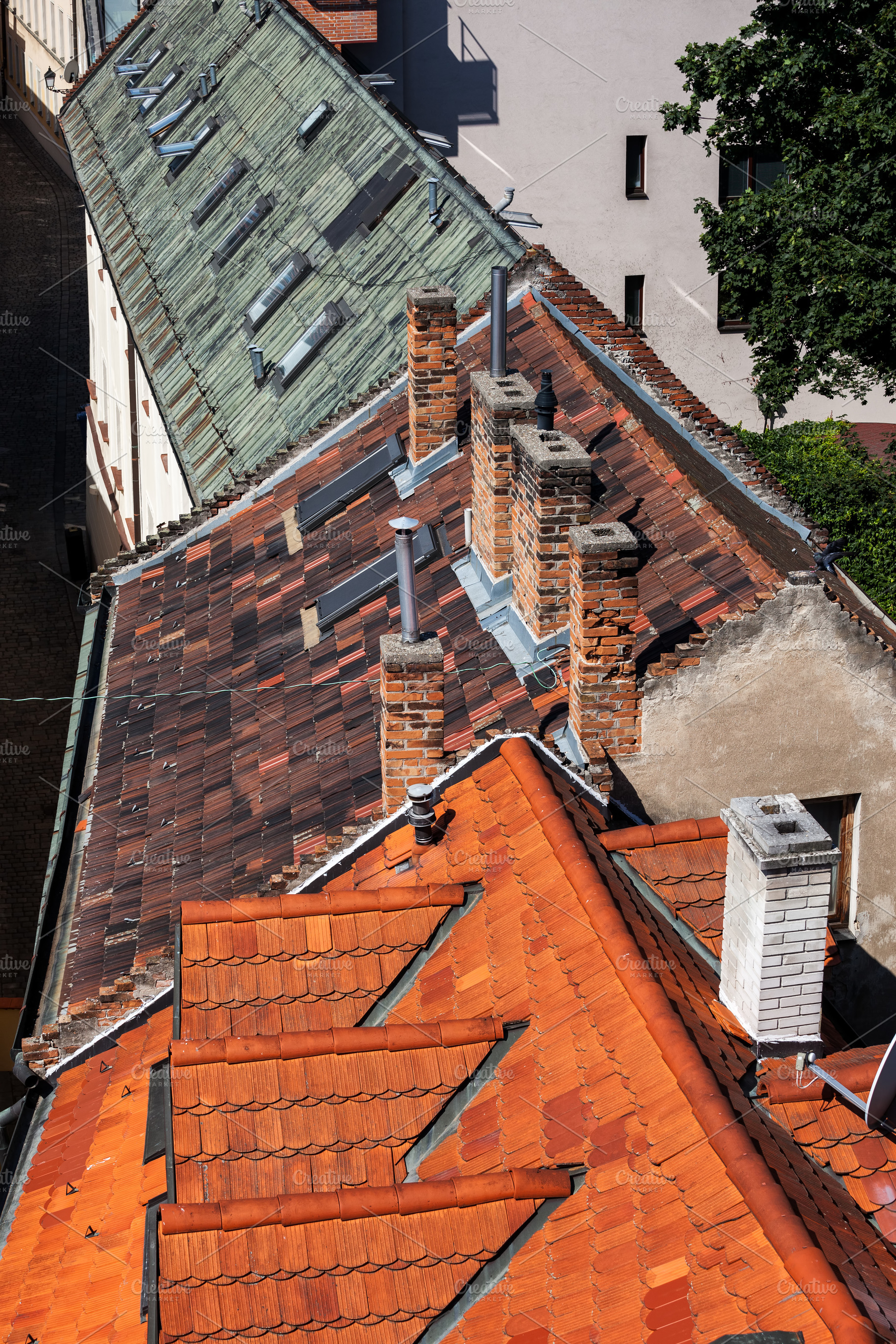Old Houses Tiled Roofs In Bratislava, an Abstract Photo by Artur Bogacki