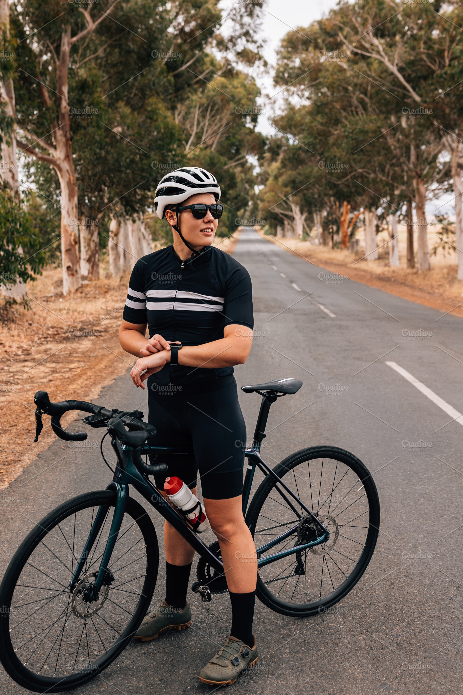 Full length of female cyclist, a Person Photo by Artem Varnitsin