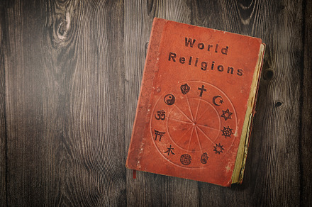 World religions book with symbols on wooden table top view, a School & Education Photo by Davizro's Market