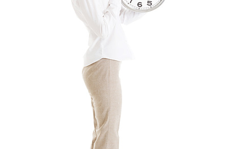 Young beautiful business woman holding clock containing business, clock, and