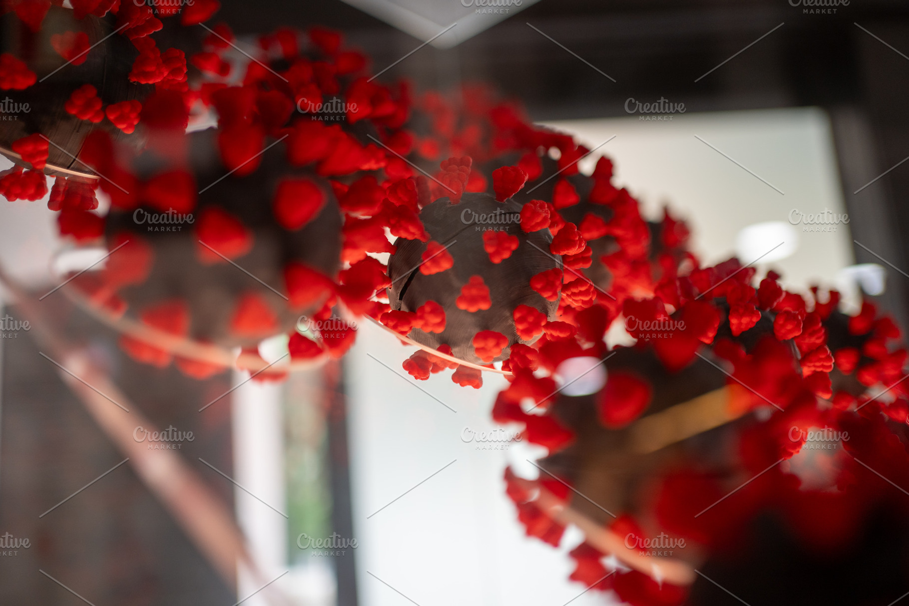 Detailed shot of COVID-19 cell bacteria scientific plastic model, a Photo by andreonegin market
