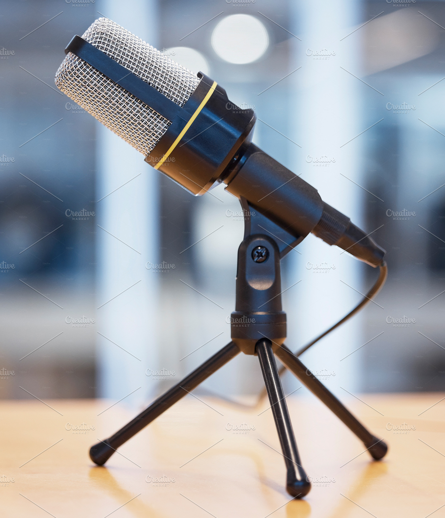 Music, podcast and radio with microphone in office for live streaming, recording and interview. Technology, network and news with equipment on desk in studio for communication, media and audio, a Photo by Peopleimages.com