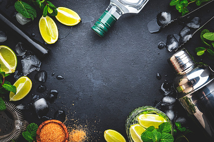 Mojito or caipirinha cocktail preparation. Mint, cane sugar, lim